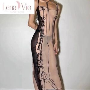 The Soft Tie Asymmetrical Mesh Peekaboo Maxi Dress